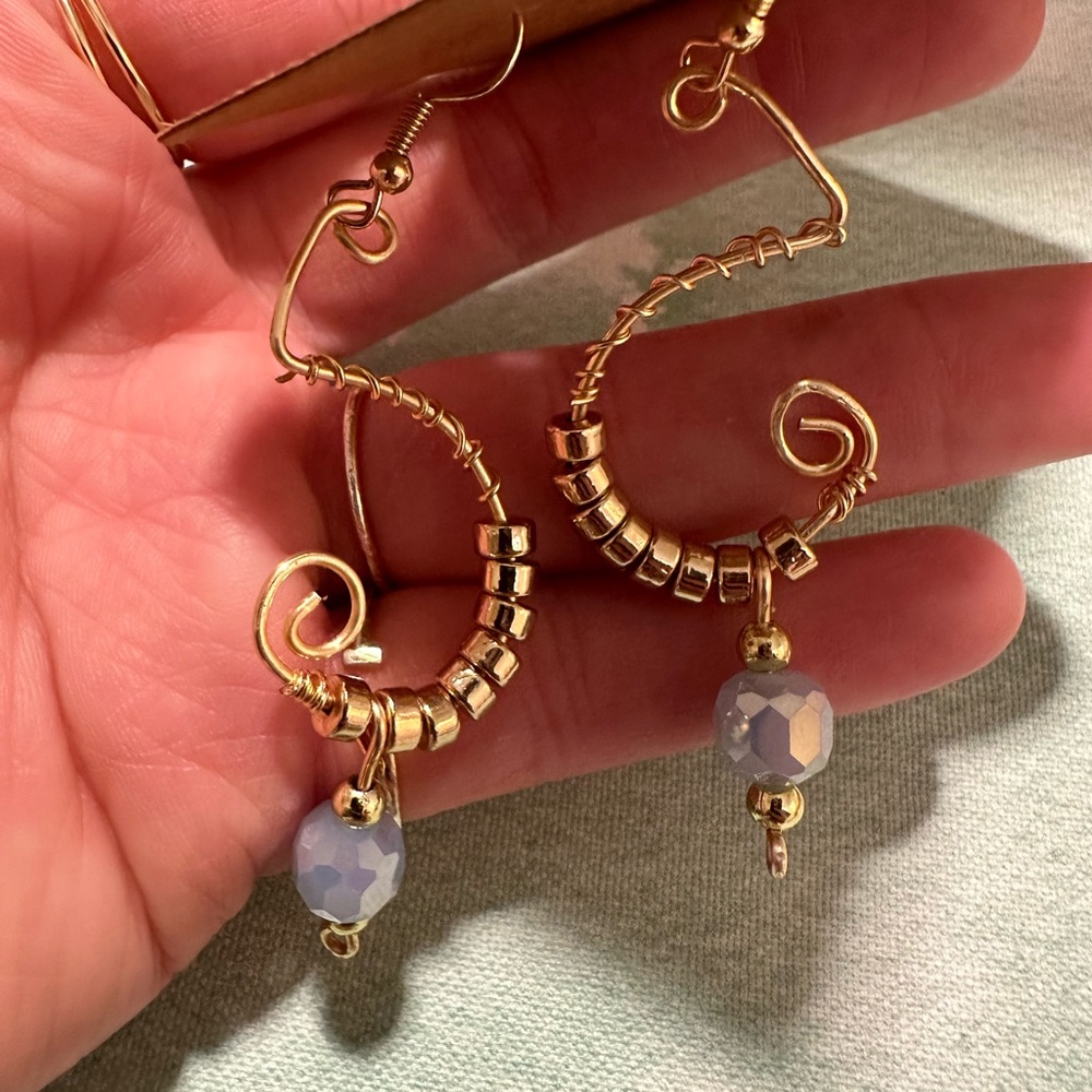 Handmade wire earrings with blue Larimar stone.